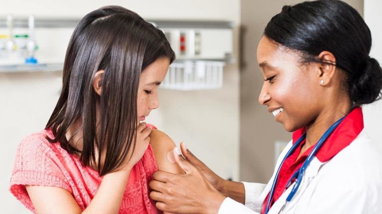 Pediatric vaccine Girl and doctor
