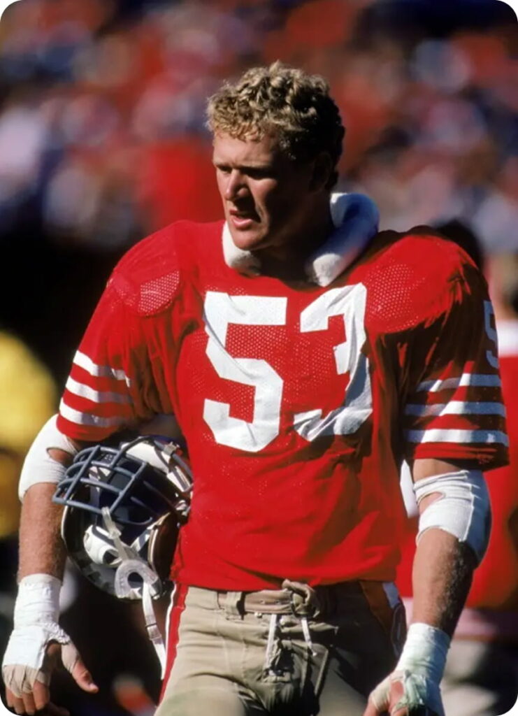 Young Dr. Milton McColl in red jersey