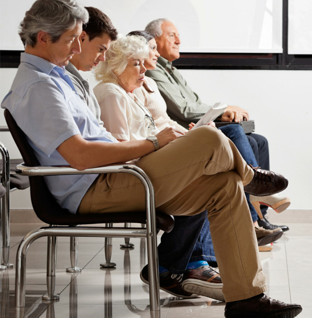 People sitting in a waiting room.